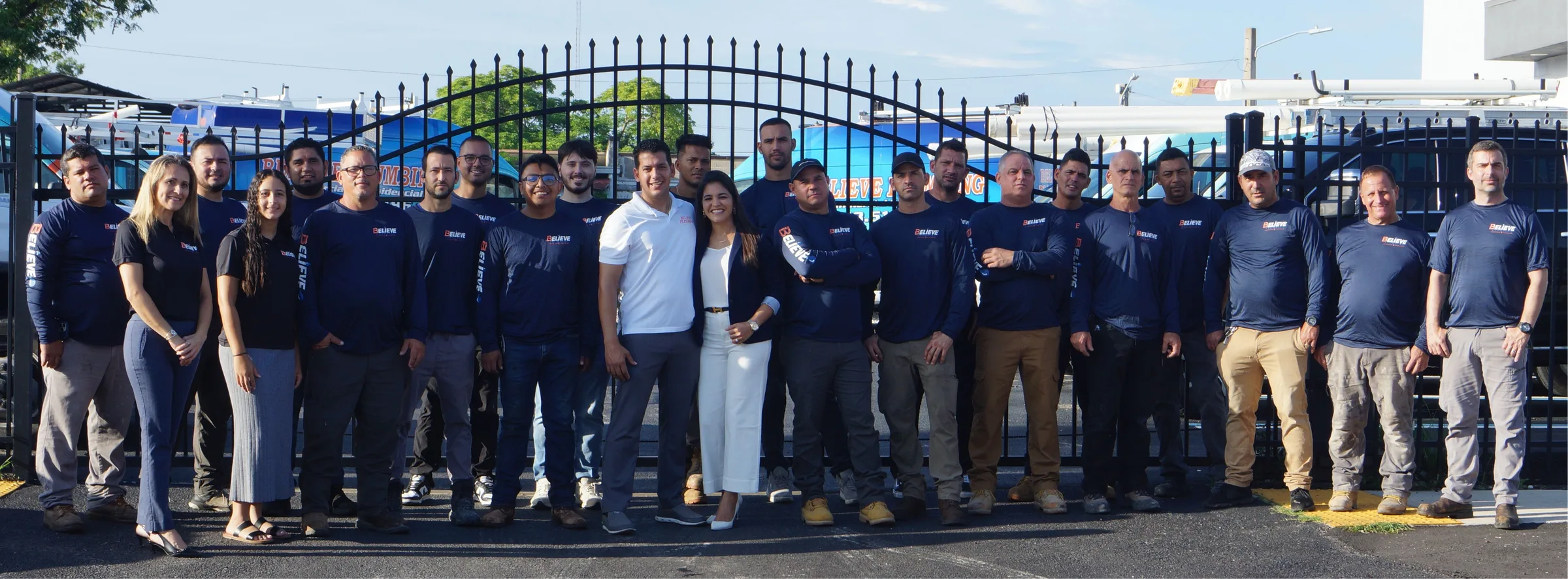 The Believe Plumbing team outside the company's Tampa Bay shop